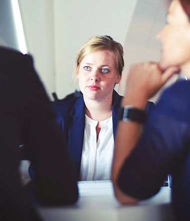 Attorney Amanda Kania speaking with a client